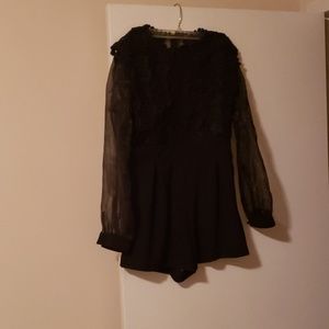 Lacy black Romper never worn!